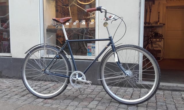 A blue men's Old Shatterhand outside the shop