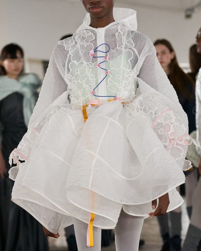 A white embroidered look from the Autumn Winter 2026 show