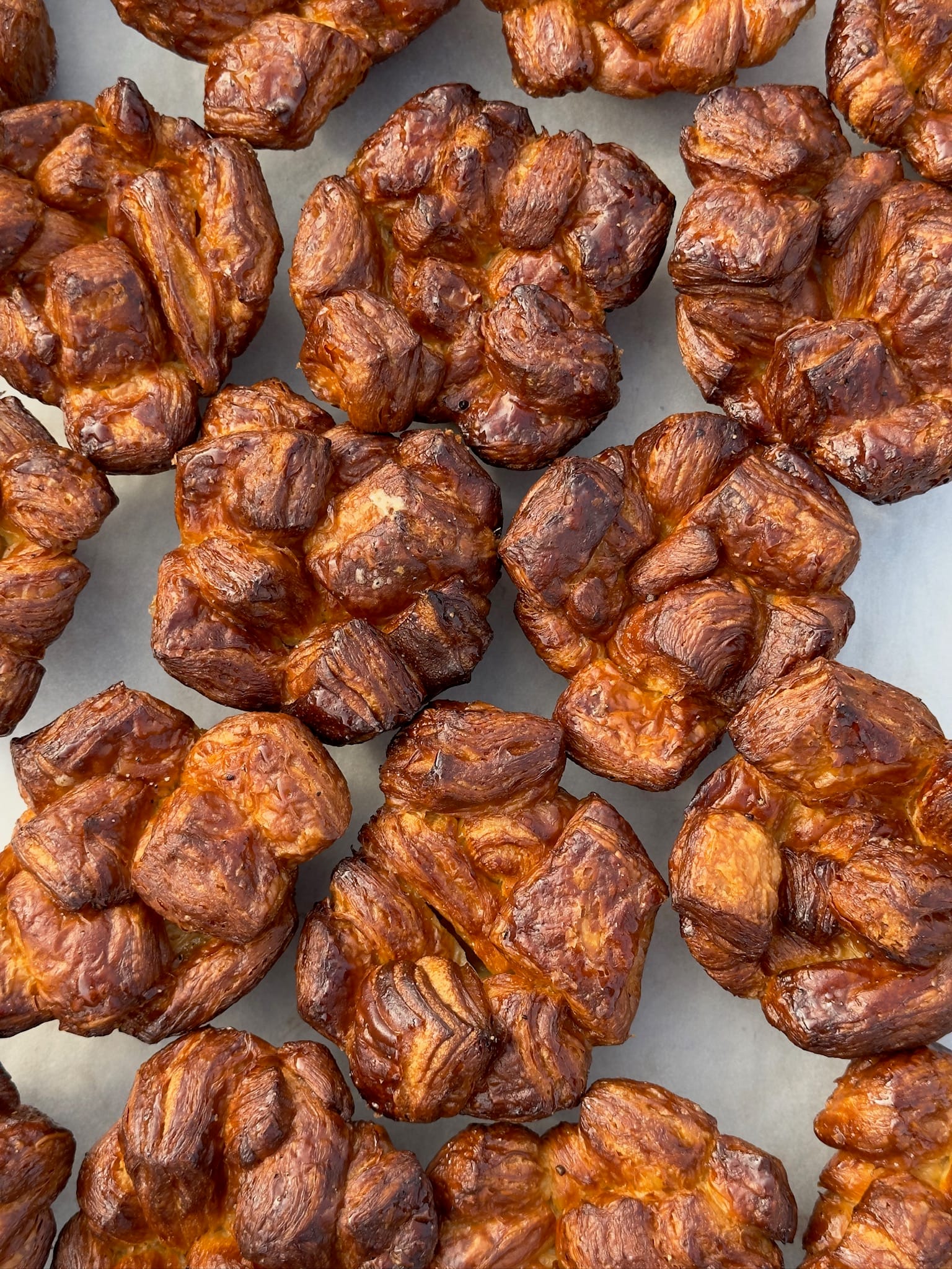 Cardamom croissants on a baking sheet