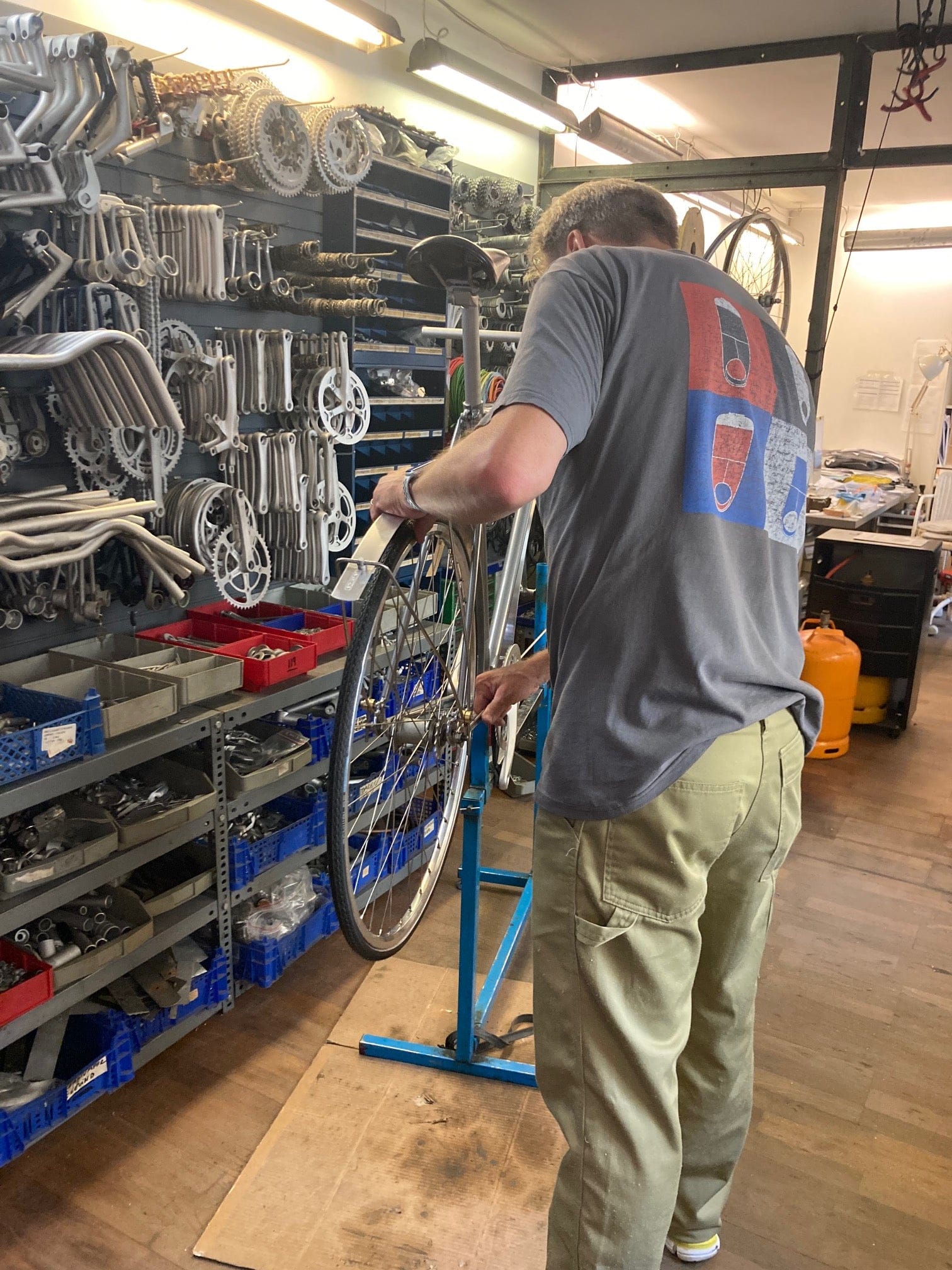 Inside the Sögreni workshop, a wheel being built by hand