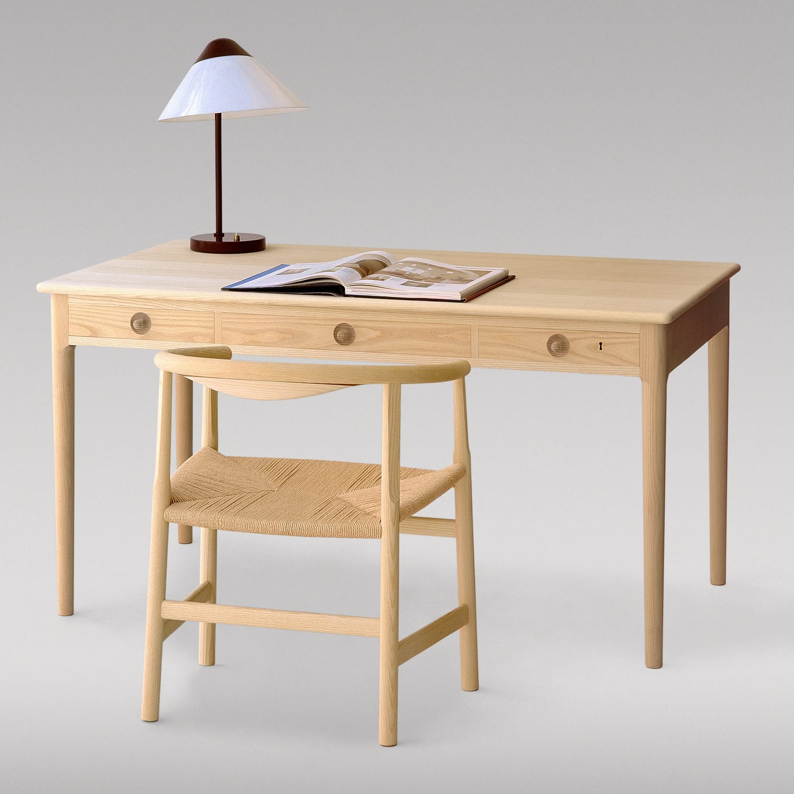 The PP201 in ash at a desk