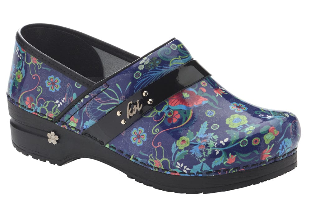 A Koi by Sanita clog in a blue floral patent print