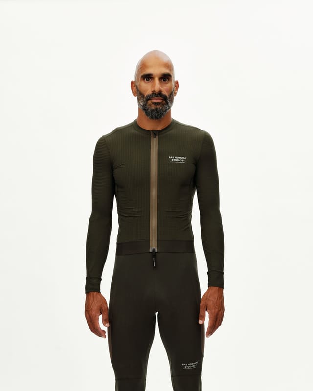 Rider in a long-sleeved jersey and bib tights