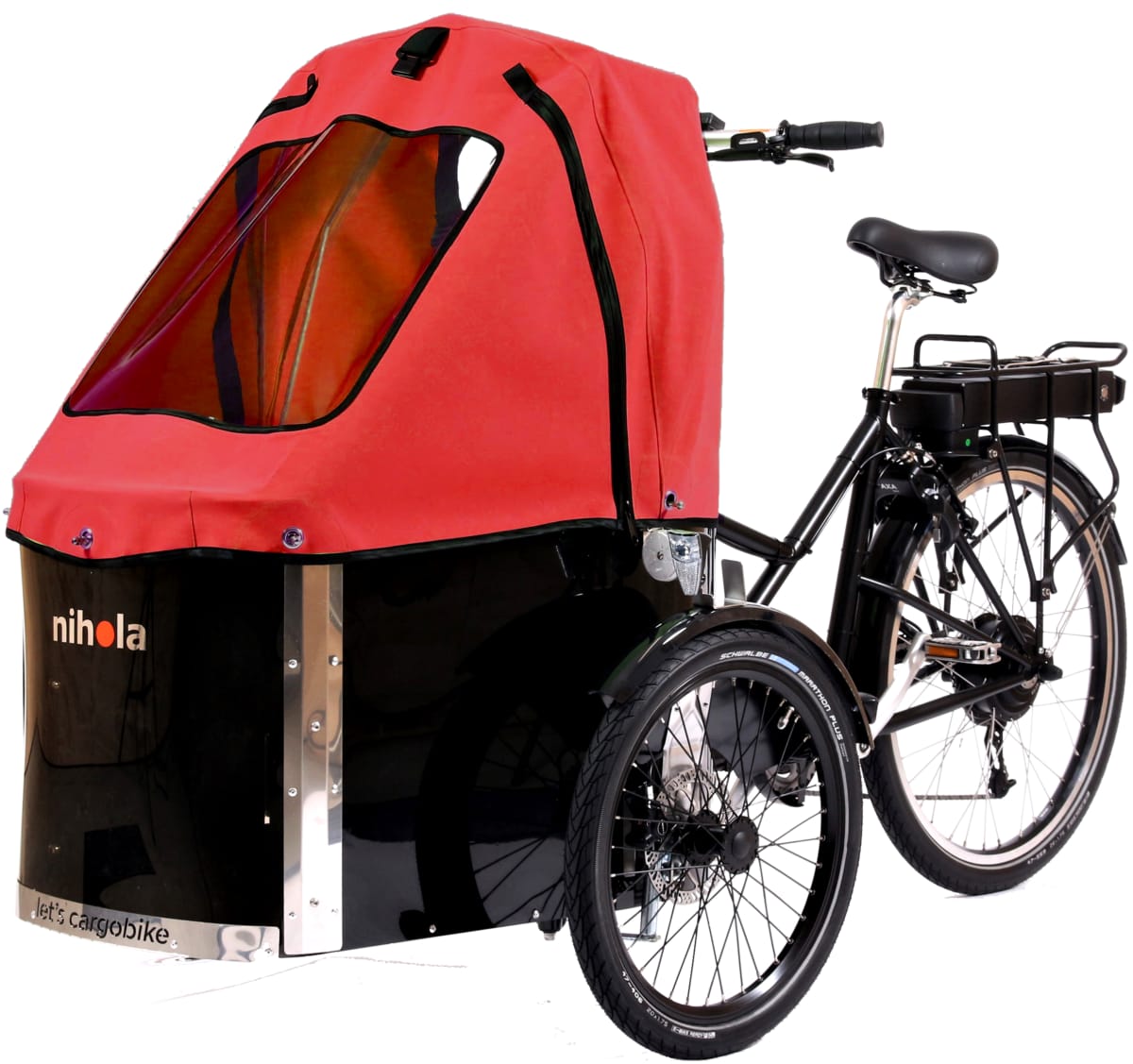 The Nihola Family with a red rain cover