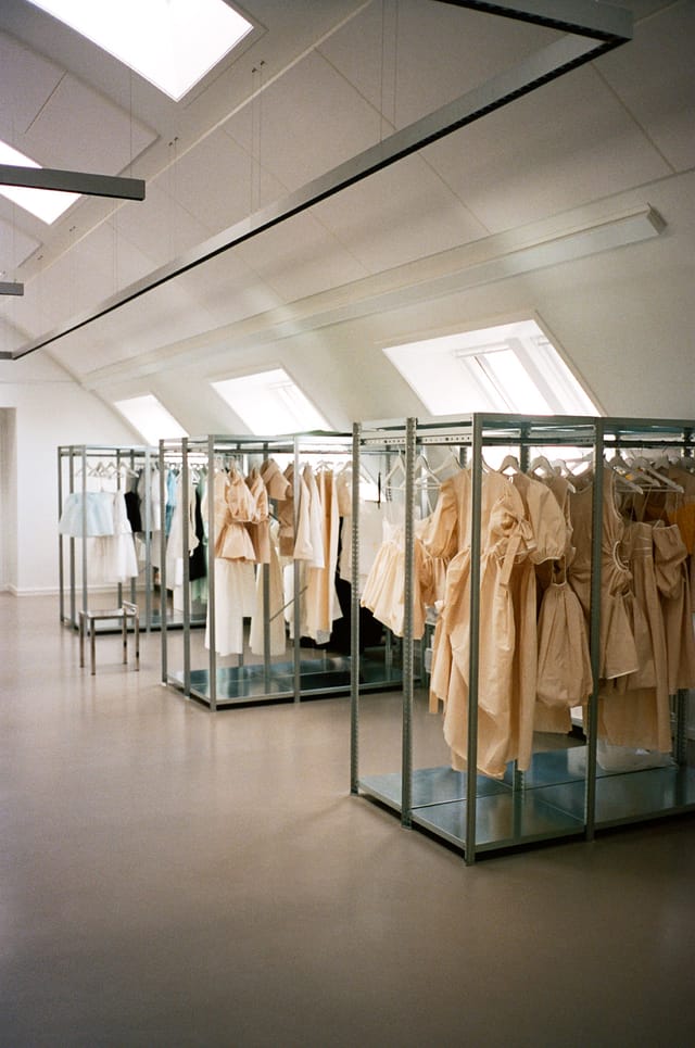 Rails of dresses in the Vermundsgade studio