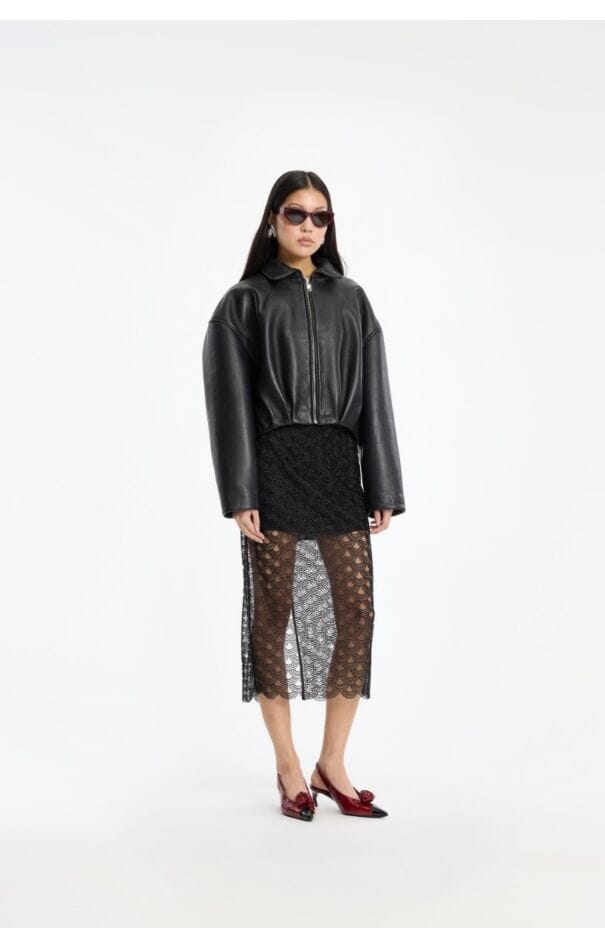 Collared boxy leather jacket with a lace midi skirt
