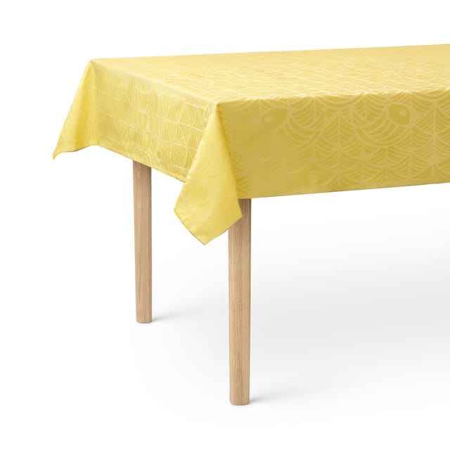 The yellow Easter tablecloth on a table
