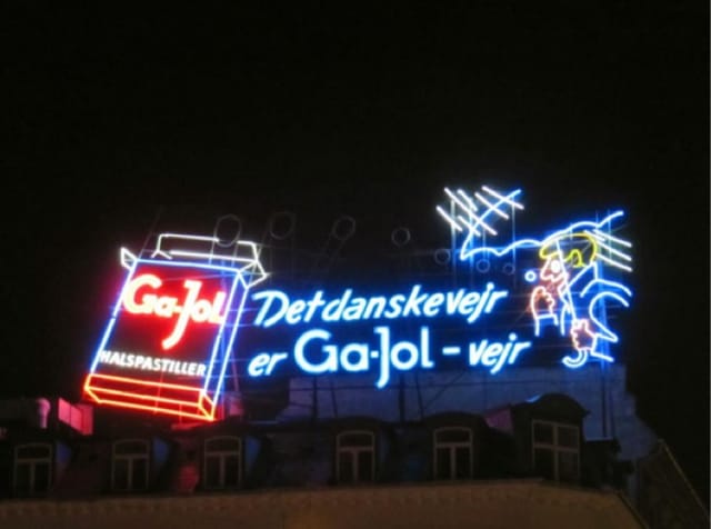 The neon Ga-Jol sign and Ga-Jol man at night