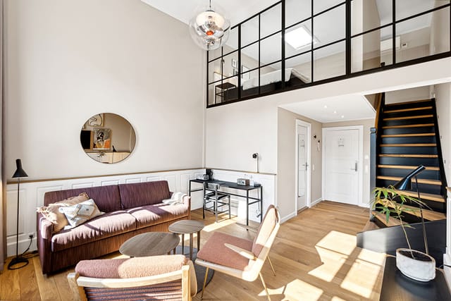 A LOFT suite with its bed on the upper level