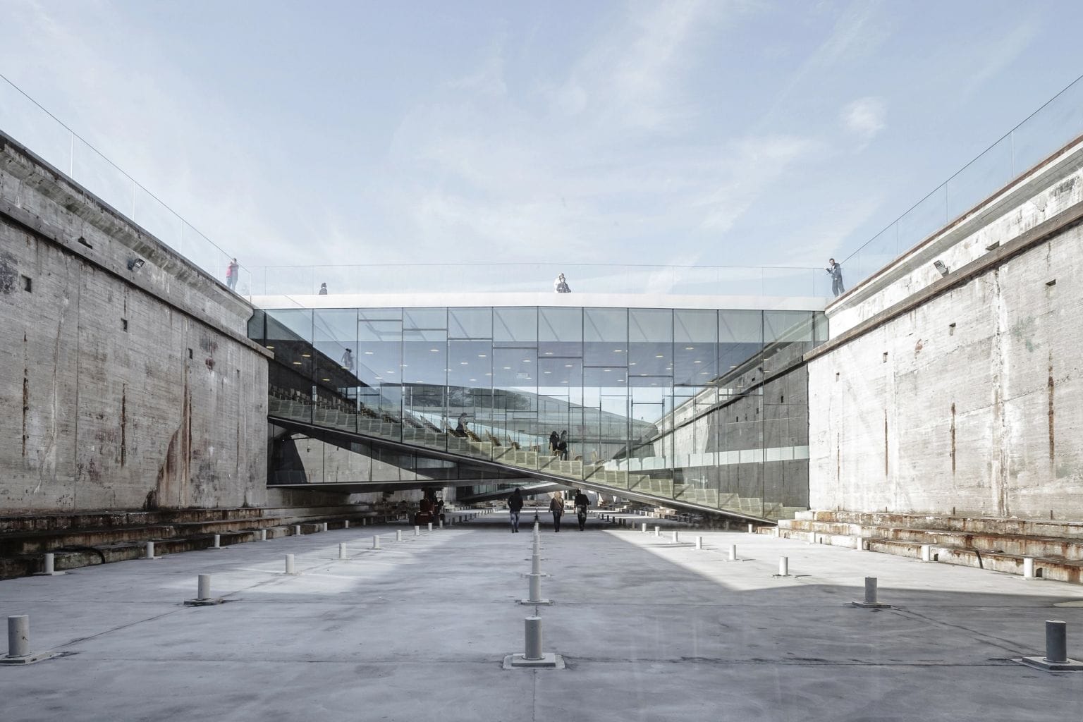 The old dry dock with the museum's glass bridge across it