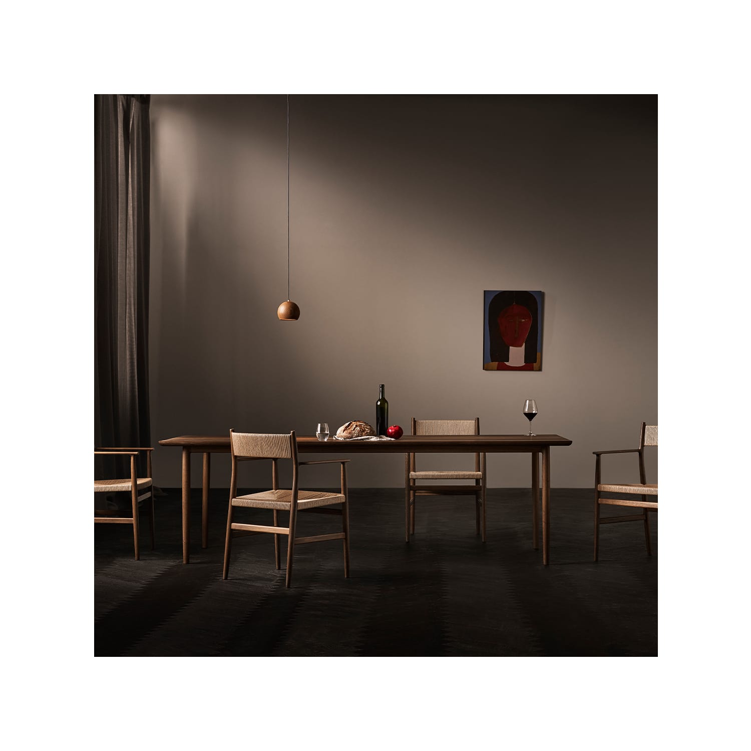 The Arv table in dark oak with Arv chairs