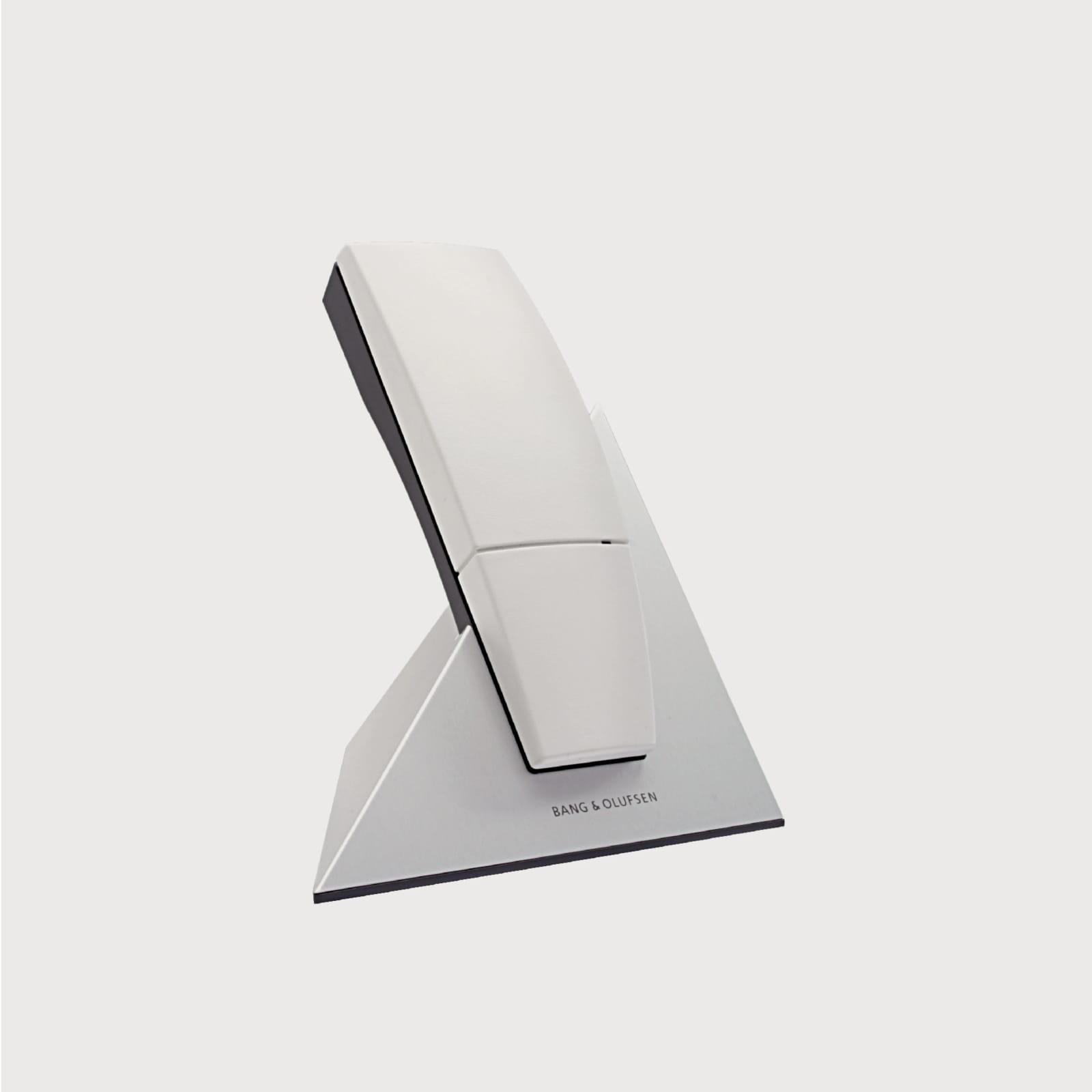 BeoCom 6000 handset in its table charger