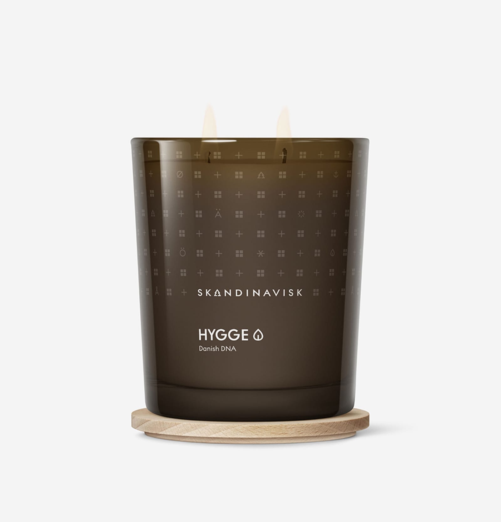 HYGGE scented candle on its wooden lid