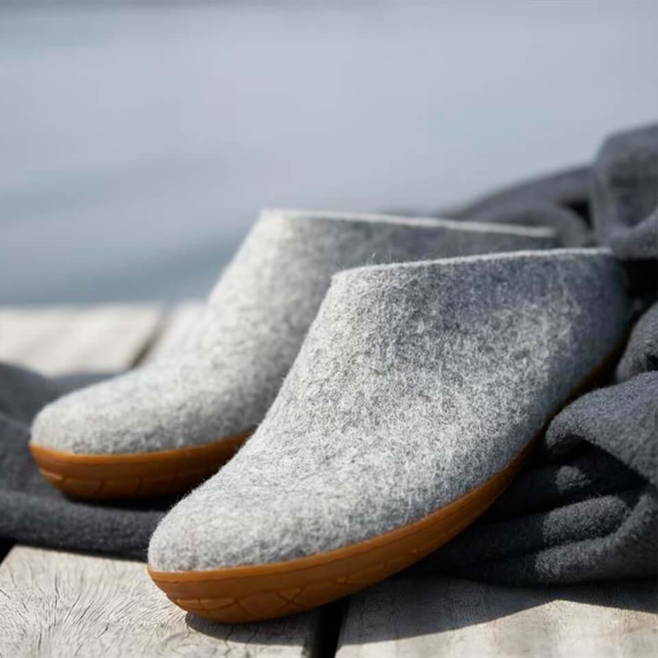 Grey felted wool slip-ons with honey rubber soles