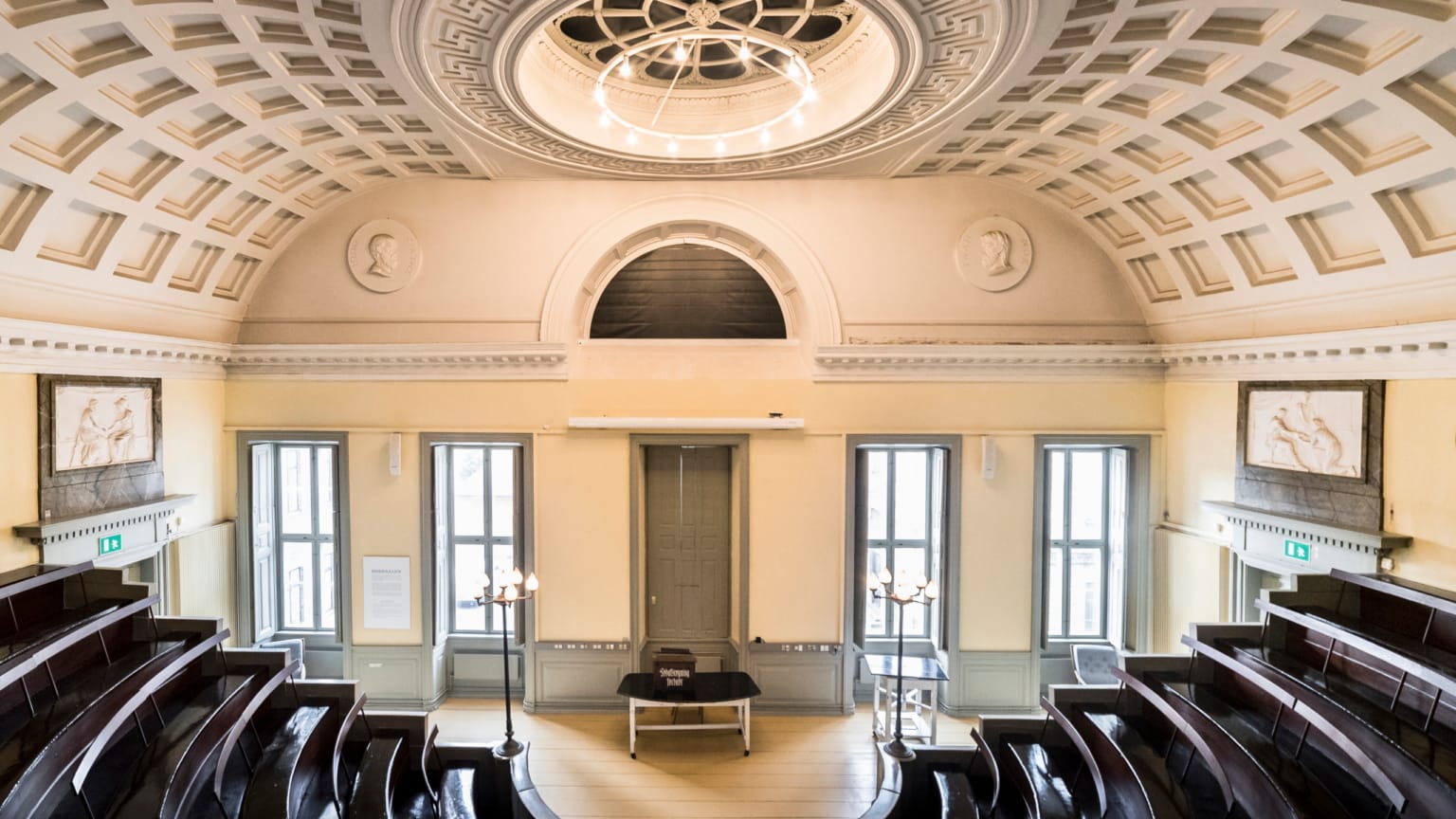 The domed auditorium with its curved benches and reliefs