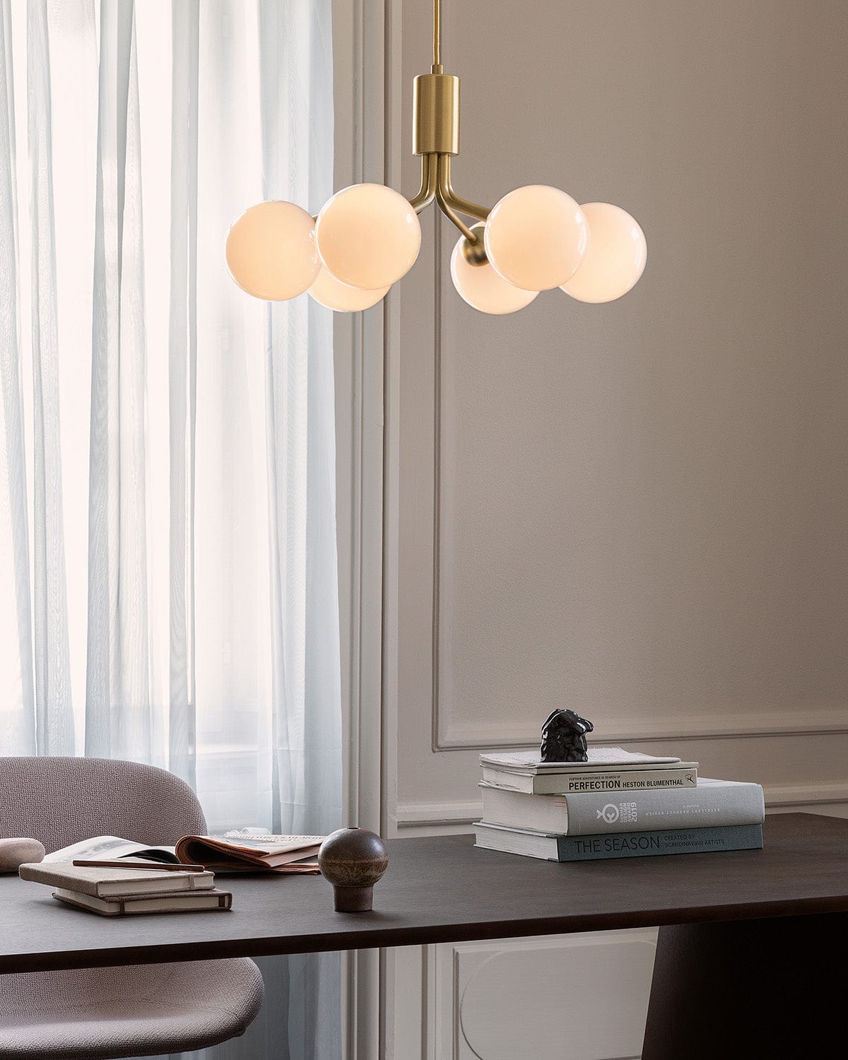 Apiales 6 chandelier over a desk
