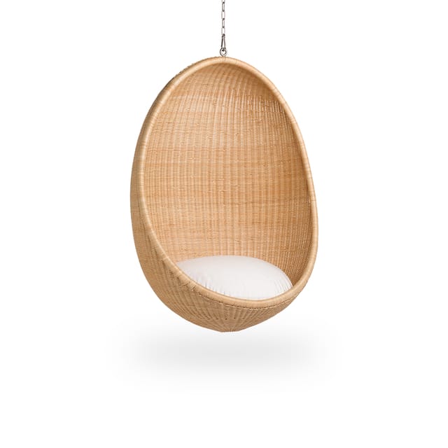 Hanging Egg Chair in natural rattan, hanging from its chain