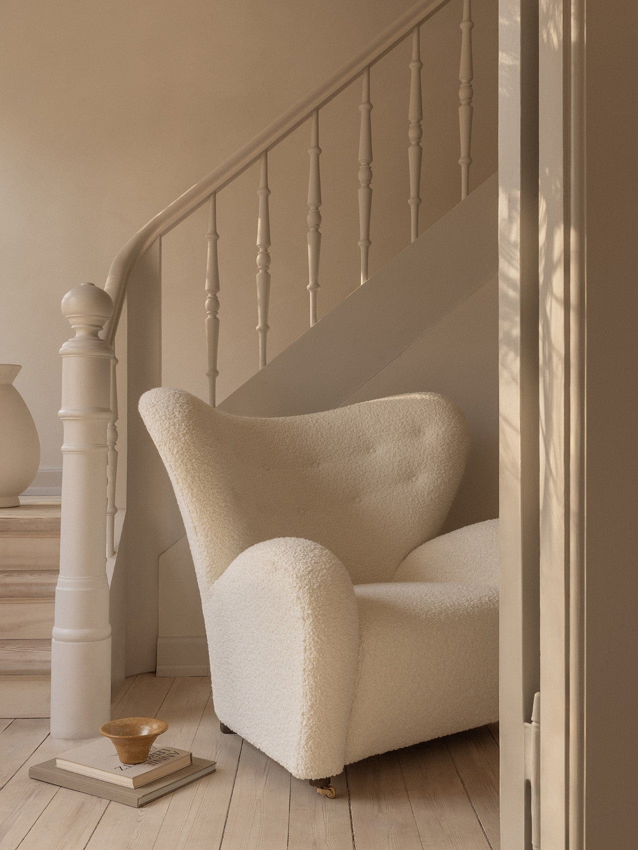The Tired Man lounge chair in white bouclé