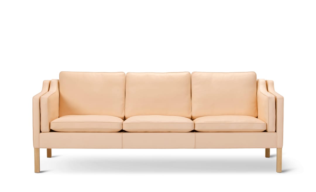 The 2213 Sofa in natural leather on soaped oak