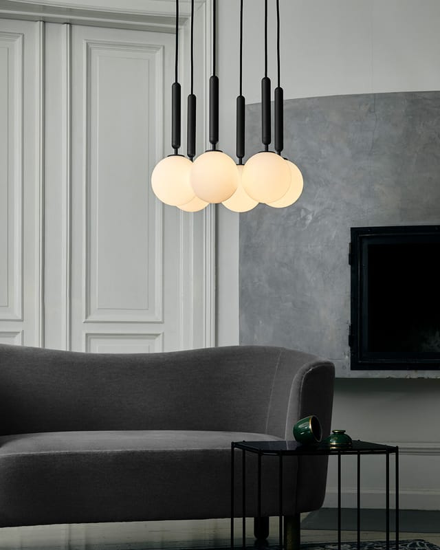Miira 6 in rock grey and opal over a sofa