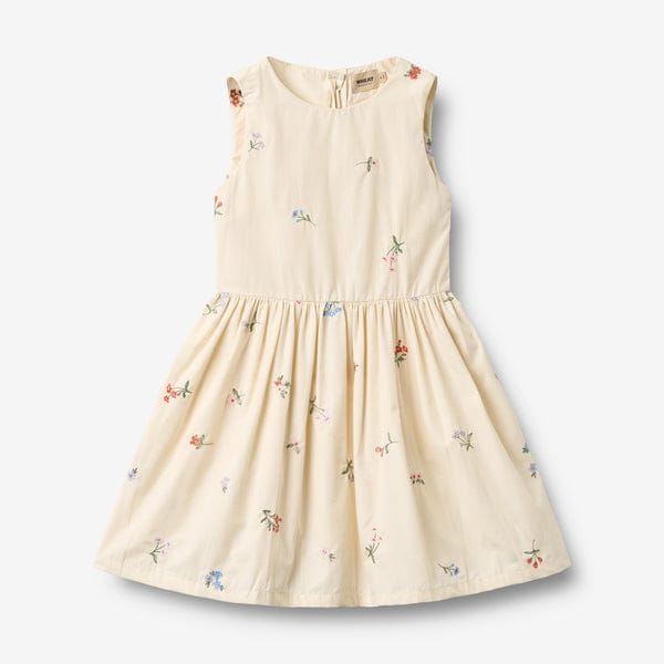 A Wheat cotton dress with embroidered flowers