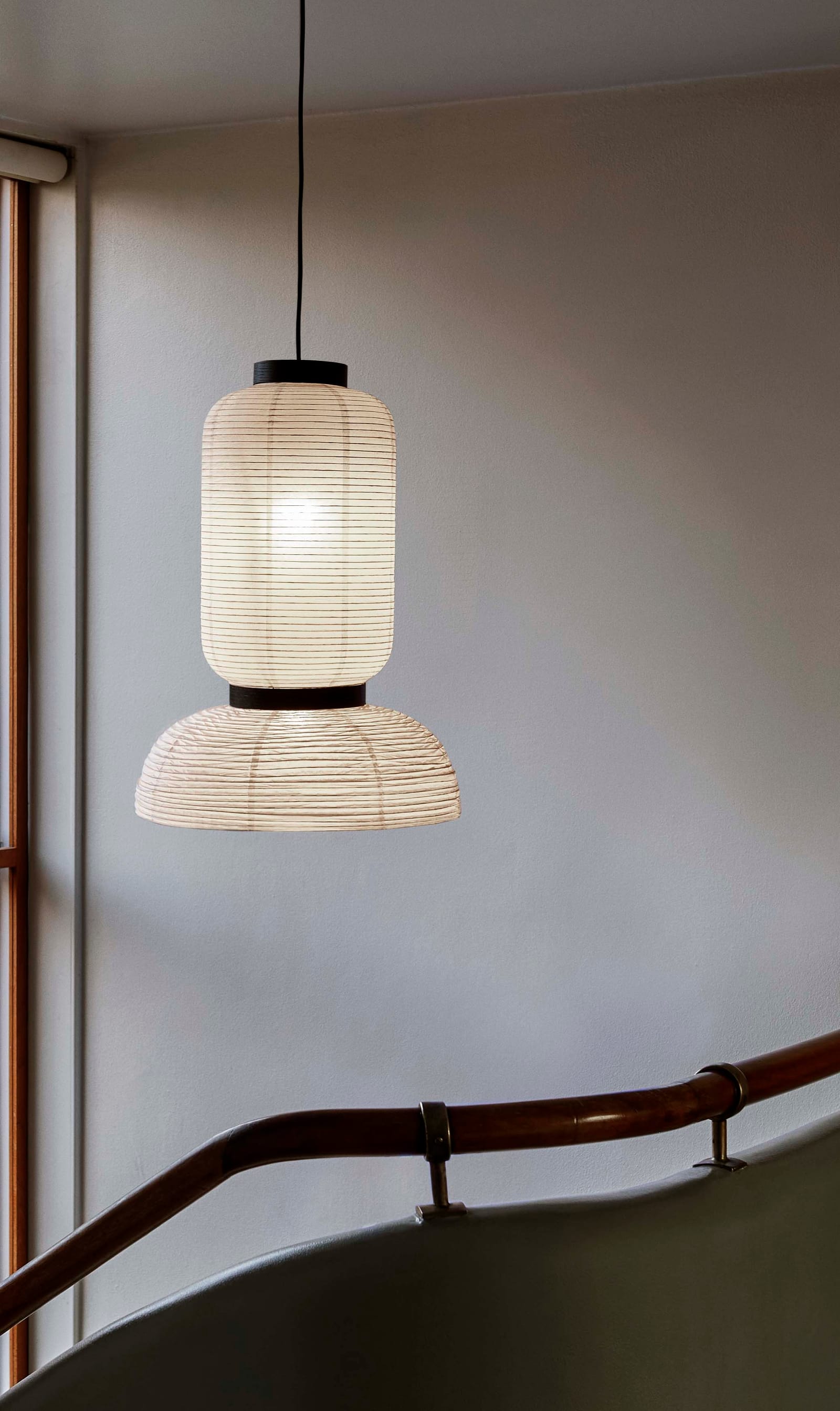 Formakami JH3 pendant lit above a stair