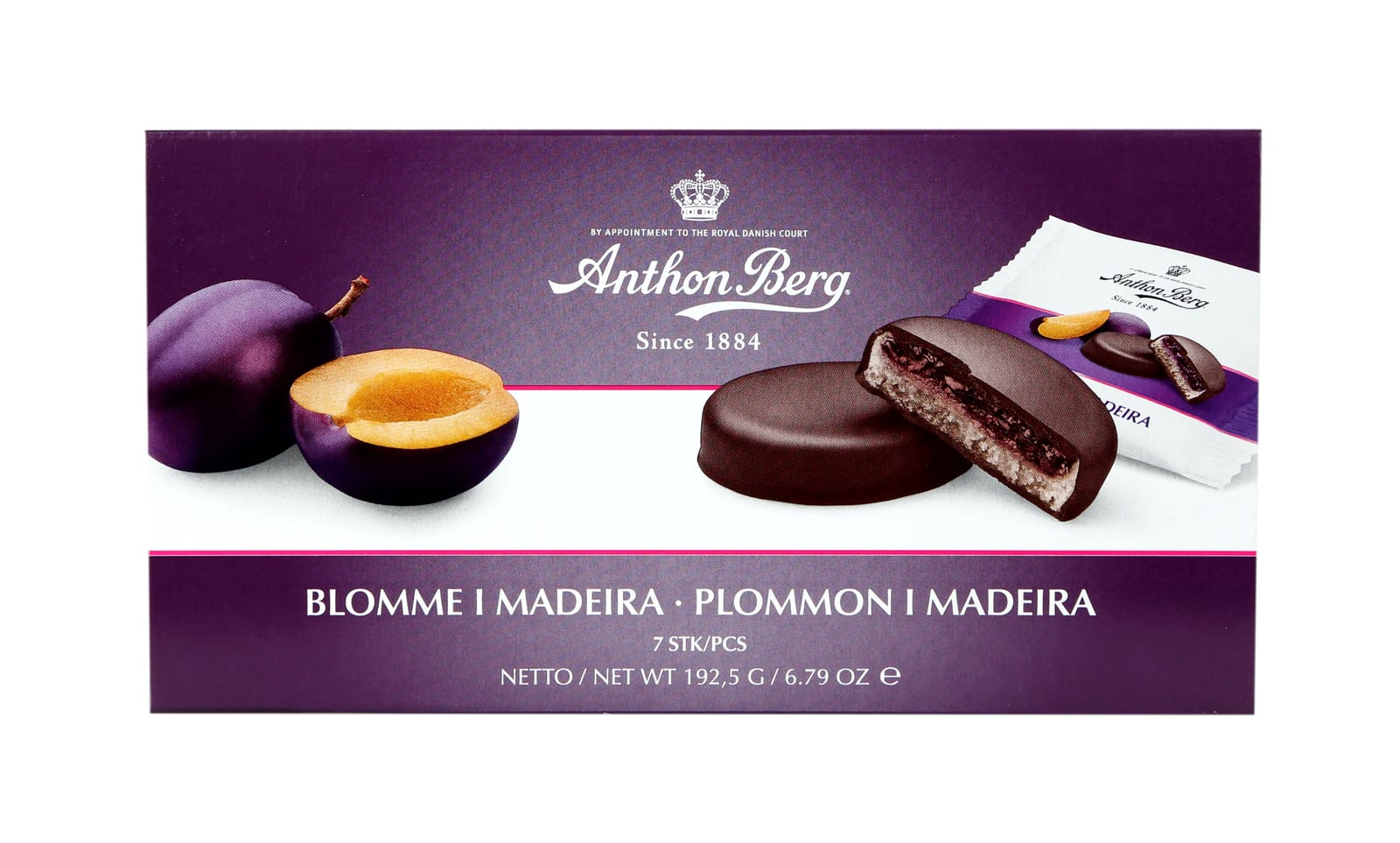 A box of Blomme i Madeira tarts, with one tart cut open