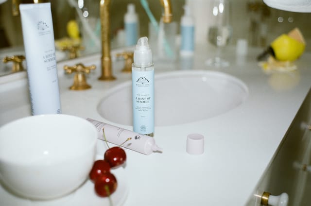The Classic and The Lotion on a bathroom basin