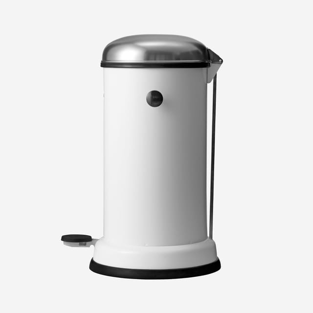 The white pedal bin from the side, with its pedal