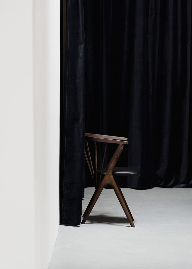 No 8 chair in dark oak with a leather seat
