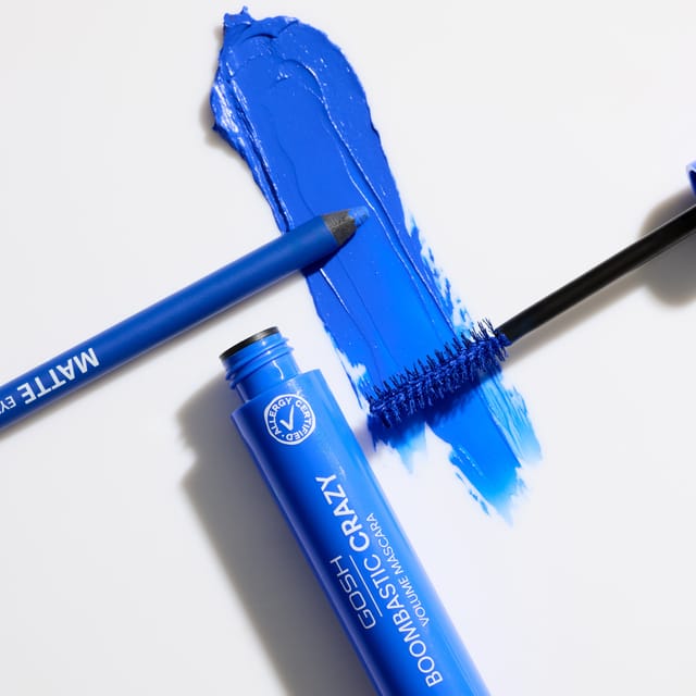 The fibre brush beside a swatch of Crazy Blue