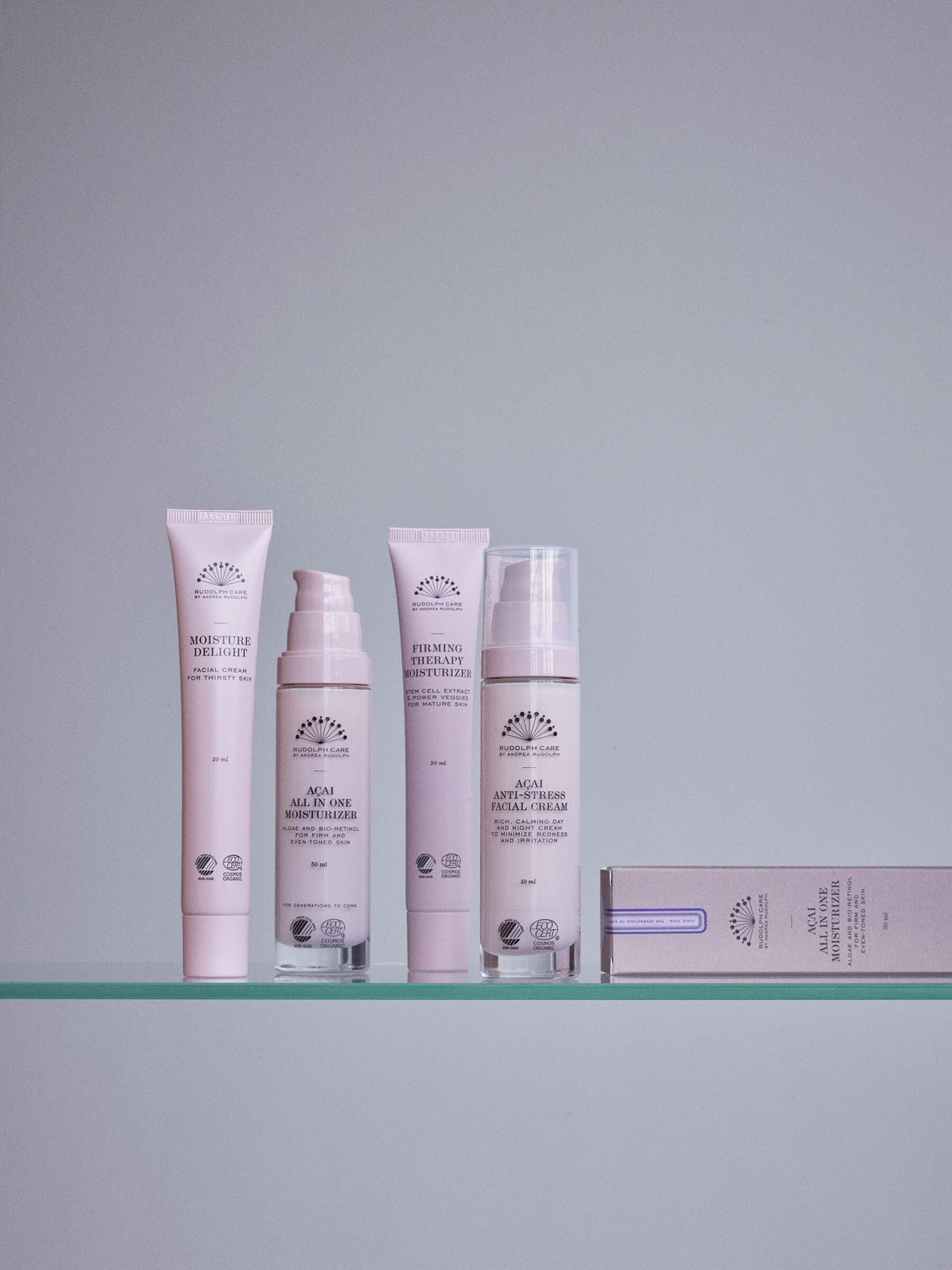 Açai face creams and moisturisers on a glass shelf