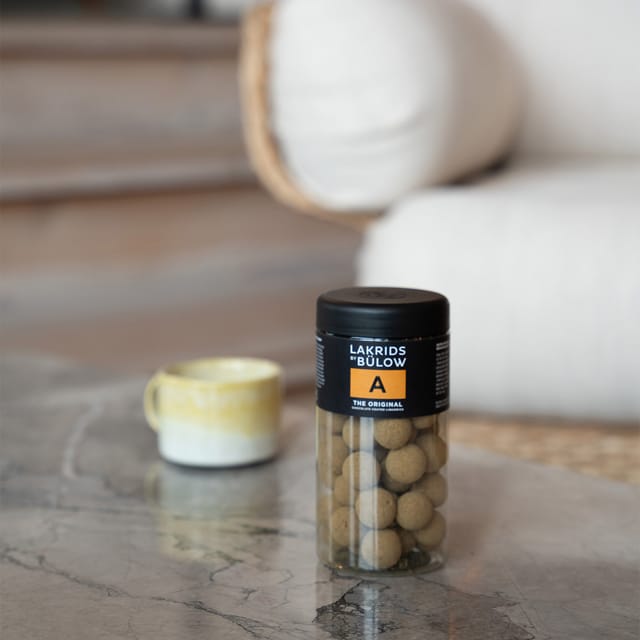 A – The Original jar on a table.