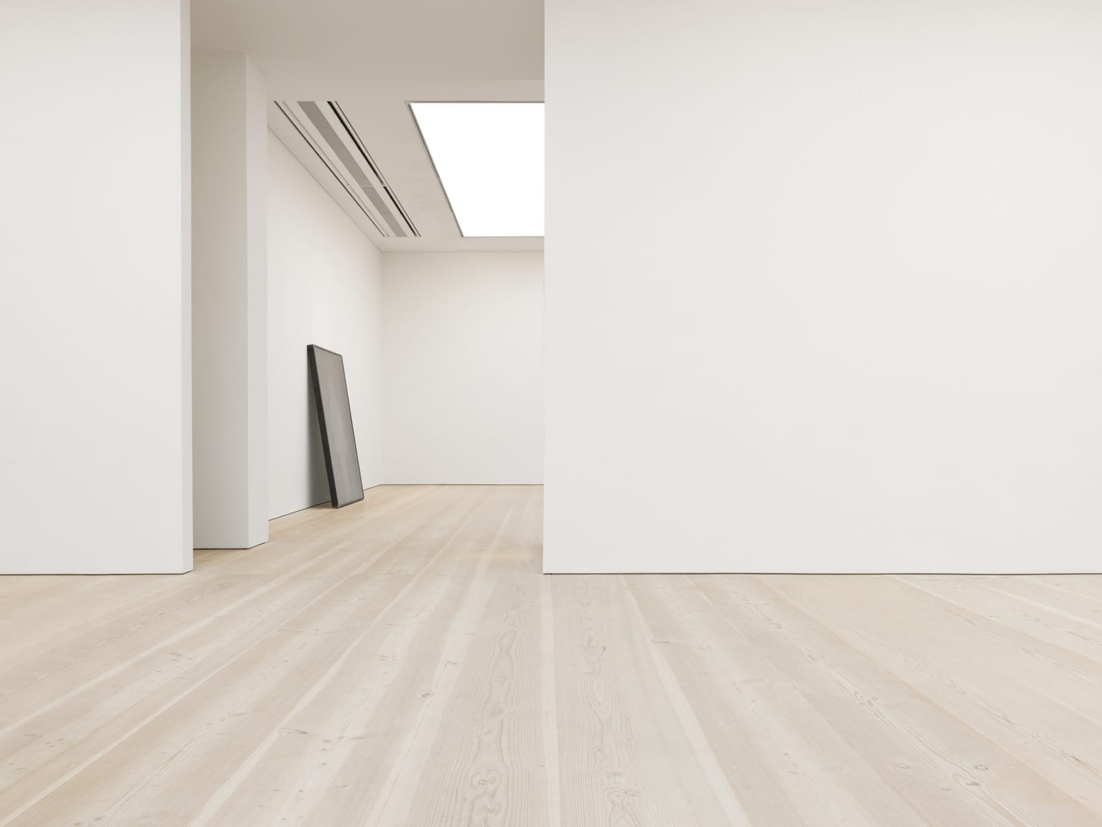 A wide Dinesen Douglas plank floor in a gallery