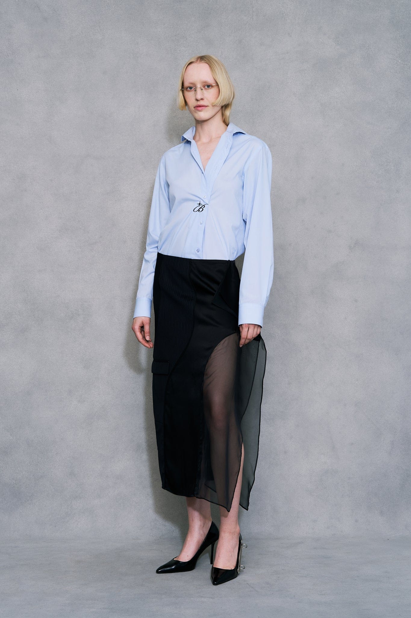 Patch Skirt, made from reassembled suit fabric