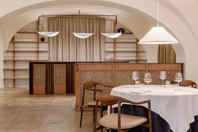 The vaulted dining room and bar
