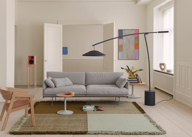 Outline sofa and Contra floor lamp in a living room