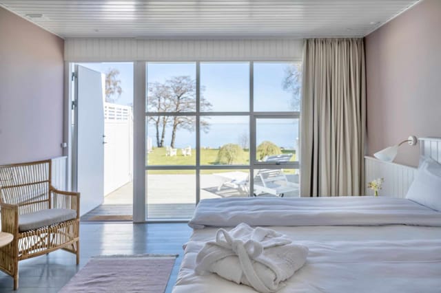 A double room in Fyr Anneks, looking out to the sea
