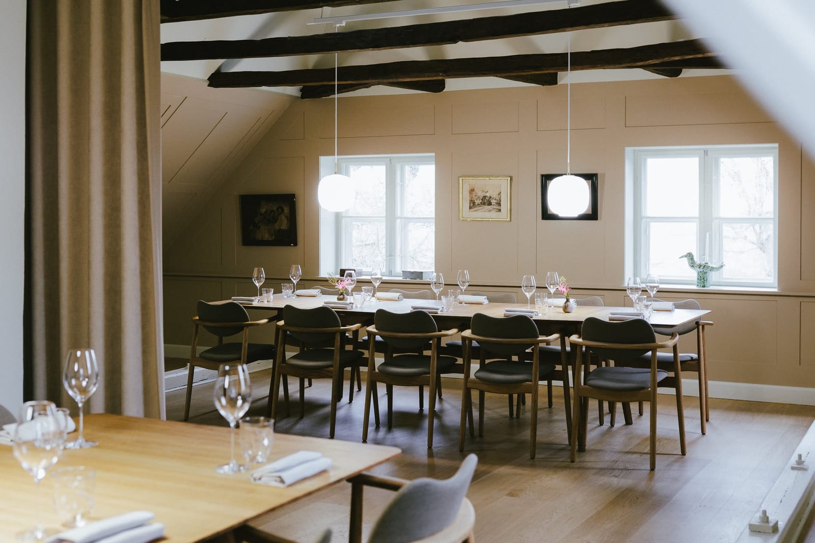 The private dining room under the mill's timber beams