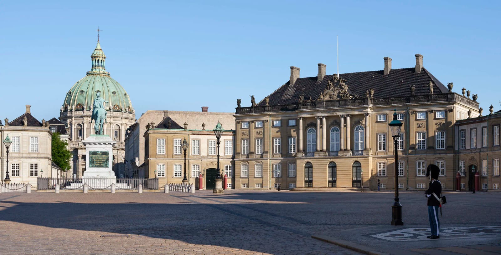 Amalienborg square with a palace, the statue of Frederick V and the Marble Church