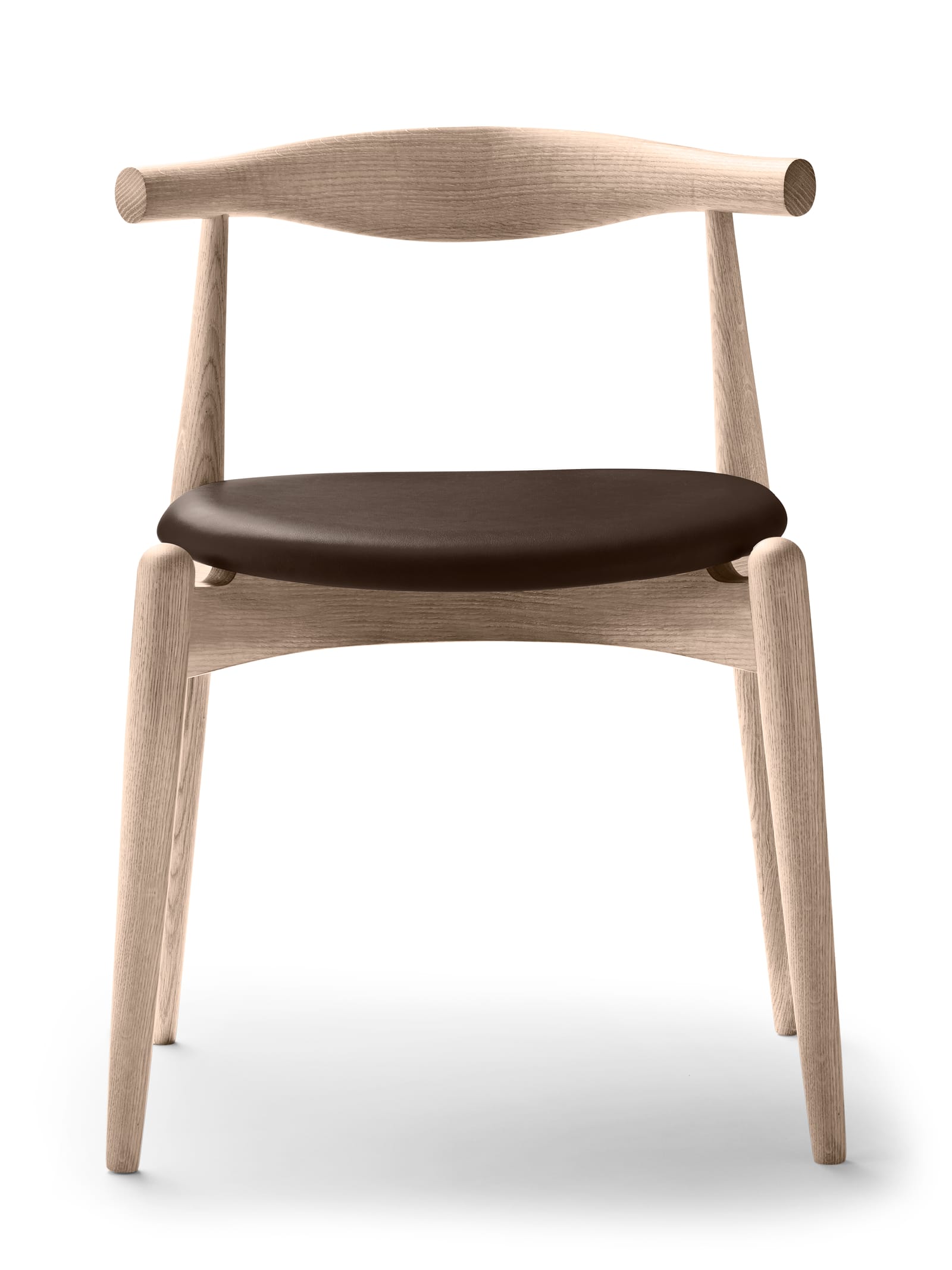 The CH20 Elbow Chair in soaped oak with a leather seat