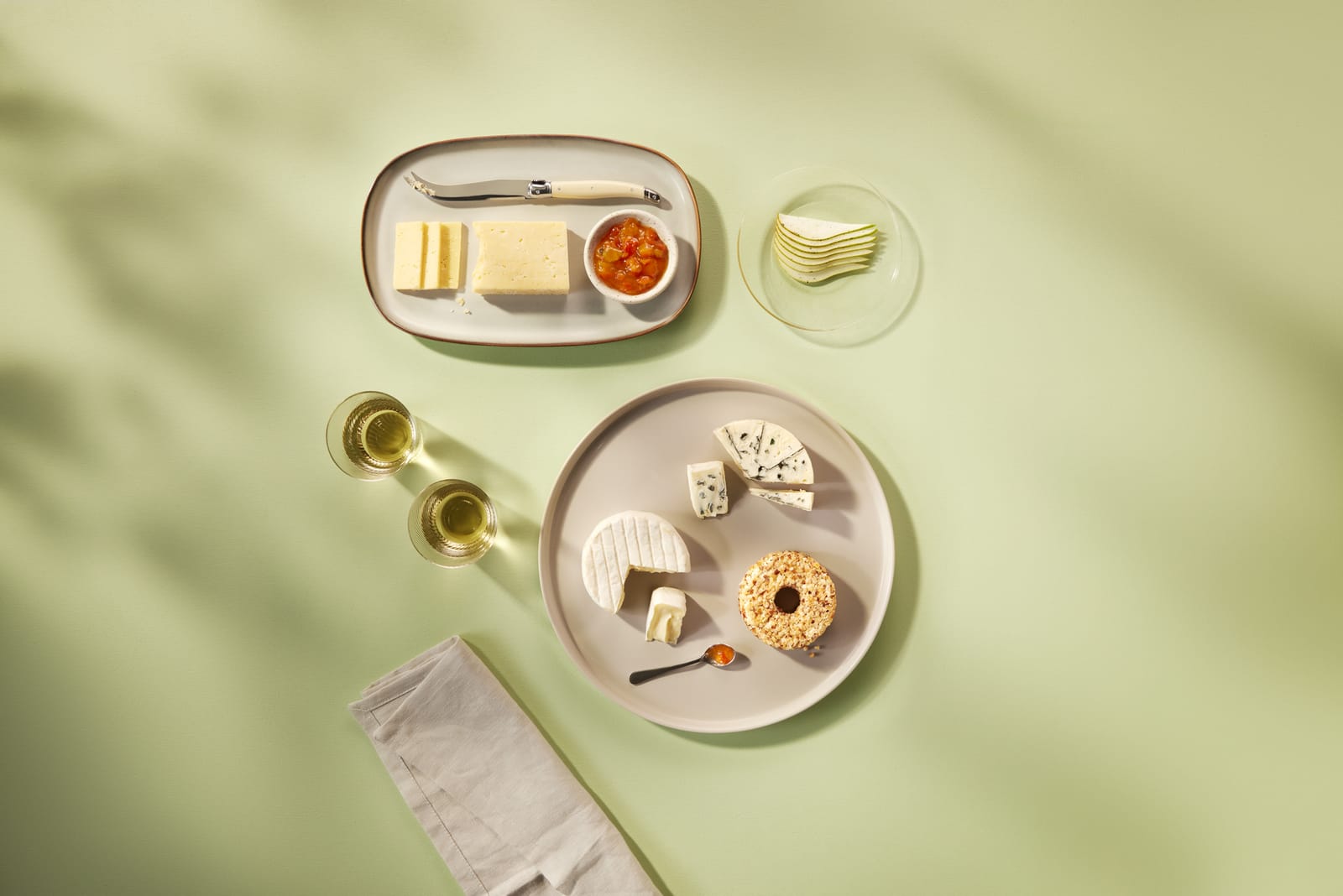 Castello white, blue and Havarti cheeses on plates
