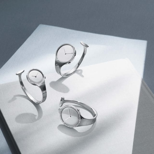 Three Torun bangle watches in steel