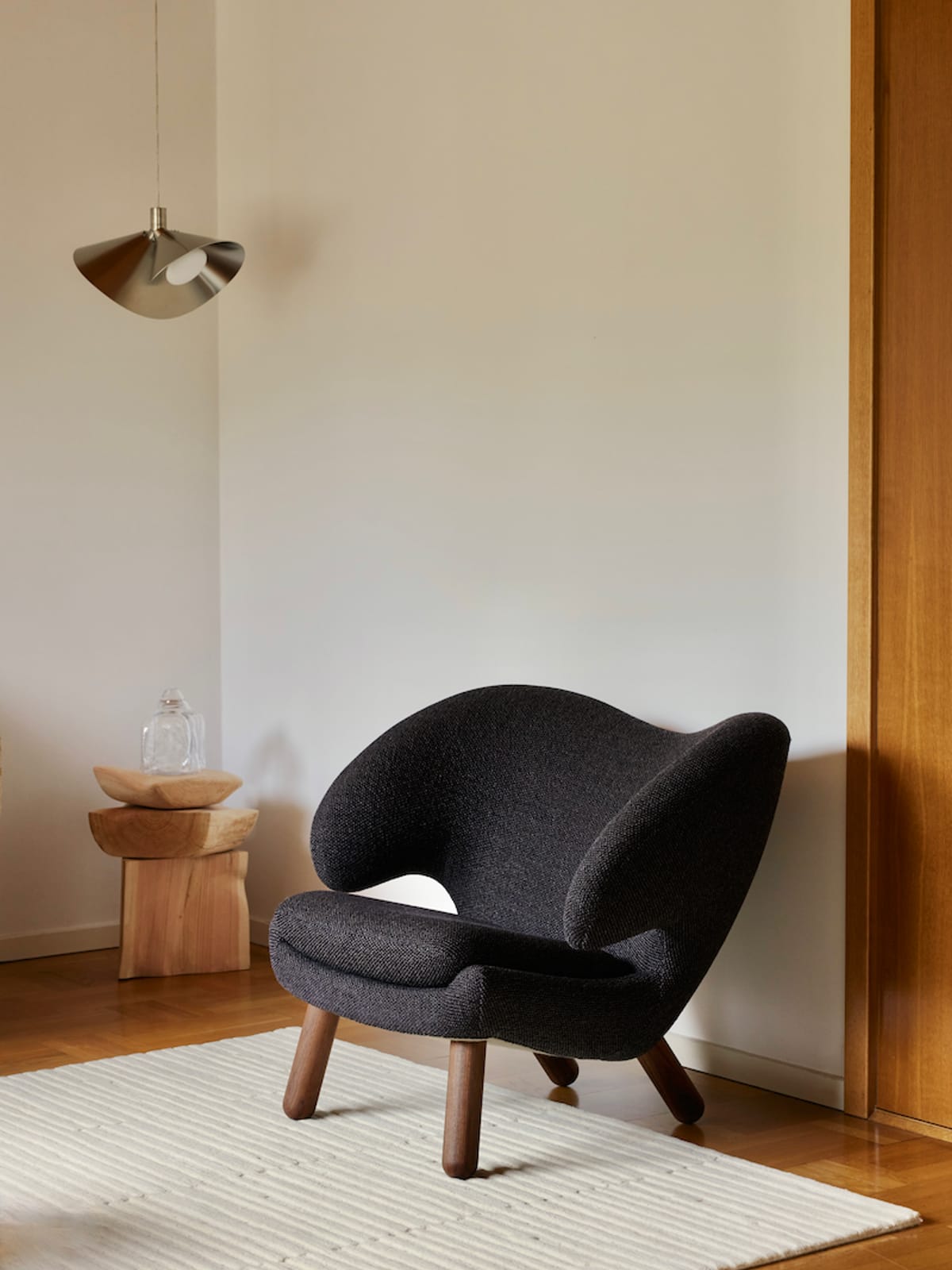 The Pelican Chair on walnut legs