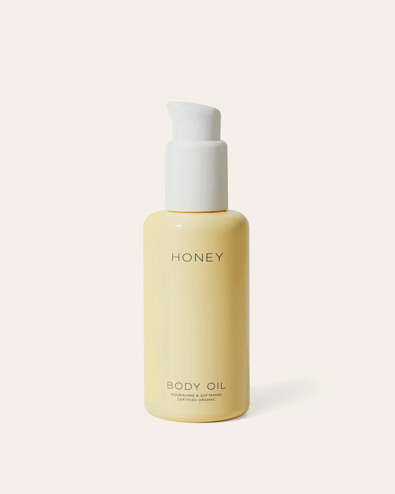 HONEY Body Oil in its bottle