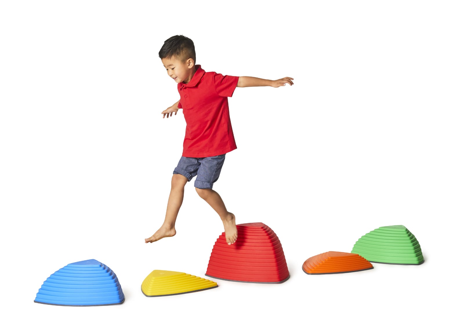 A child jumping between Hilltops in five colours