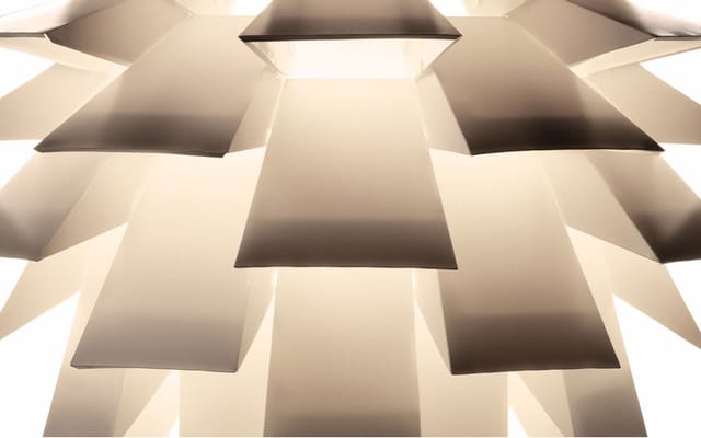 The folded pieces of the shade, lit