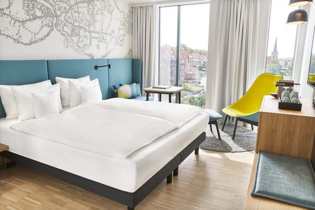 A room with windows over the old town