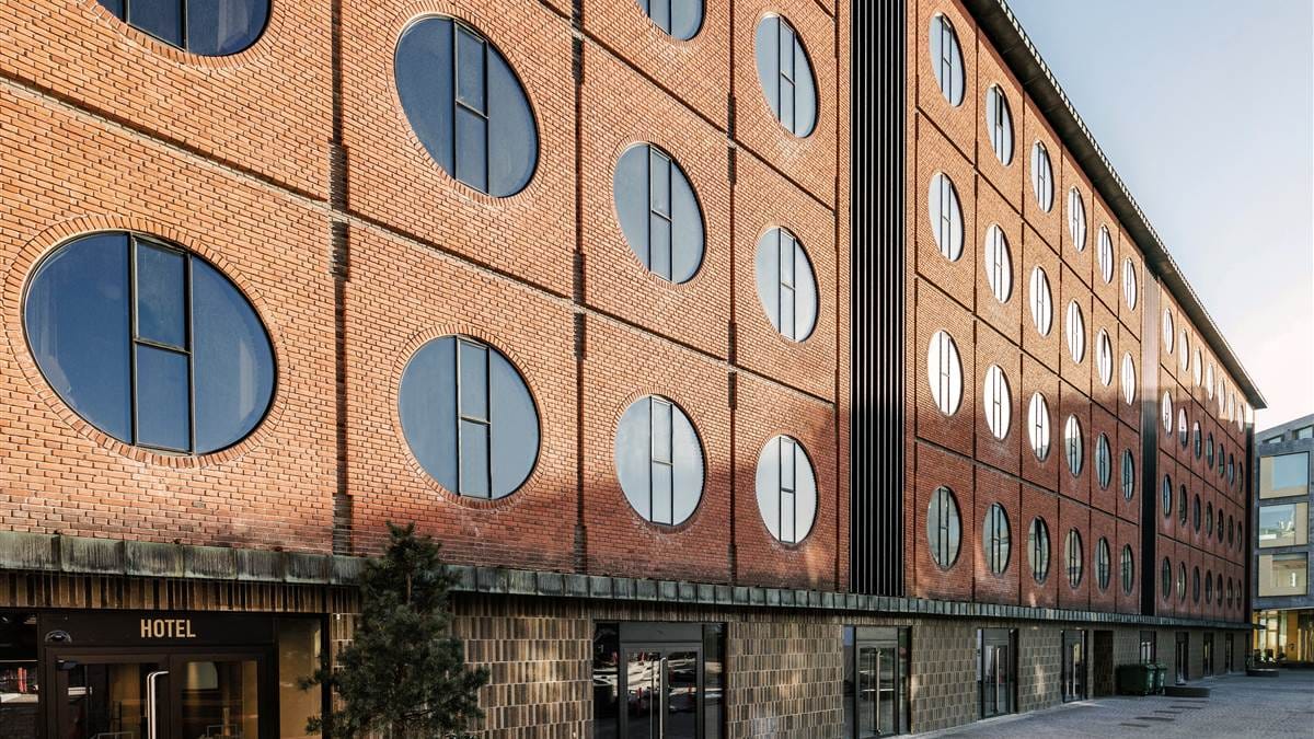 The brick façade with its round windows