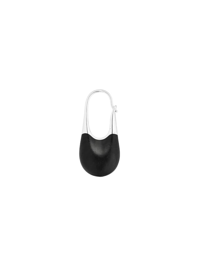 A small Doric earring in silver and mpingo